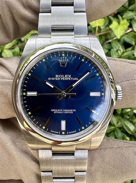 Rolex Oyster Perpetual 39 blue sunray 114300 box papers UK 